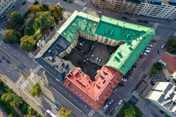 Aerial view of beautiful colorful old buildings in Helsinki, Finland. Fall color trees and sunshine.