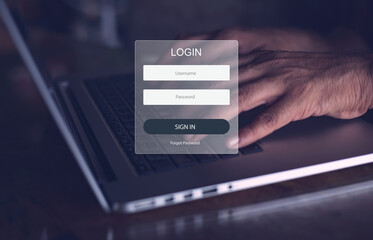 The login icon used for the website has a hand-printing on the laptop background.