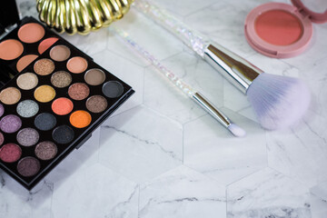 A multicolored set of shadows and blush. Cosmetics for girls and women.