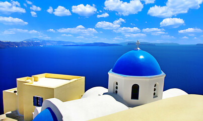 Iconic Santorini - most beautiful island in Europe. view with traditional churches in Oia village. Greece