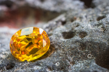 Natural yellow Sapphire gemstone, beautiful yellow gold citrin gemstone isolated on white...