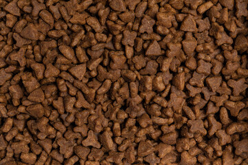 Full frame dry brown triangle pet food