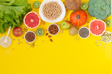 Cooking background with fresh raw ingredients for making vegetarian or vegan food