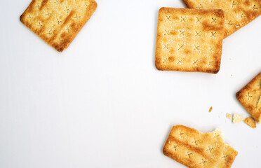 Square cracker or biscuits and cracked biscuits on white background