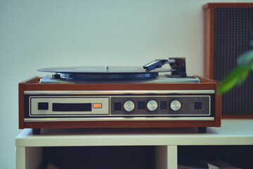 Vintage retro vinyl turntable with record