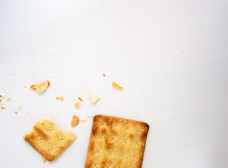 Square cracker or biscuits and cracked biscuits on white background