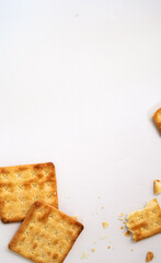Square cracker or biscuits and cracked biscuits on white background