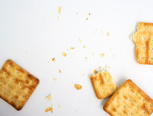 Square cracker or biscuits and cracked biscuits on white background