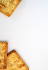 Square cracker or biscuits and cracked biscuits on white background