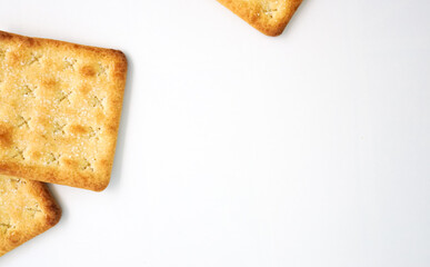 Square cracker or biscuits and cracked biscuits on white background
