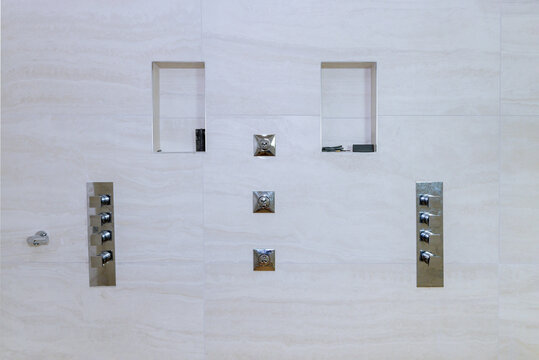 Shower reconstruction bathroom wall covered tiled in the new home that is under construction, remodeling restoration