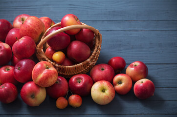 red apples on blue wooden background
