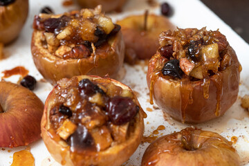Baked apples stuffed with walnuts, cranberries and granola