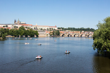 Fototapeta premium Charles bridge and prague castle sunny panorama old town