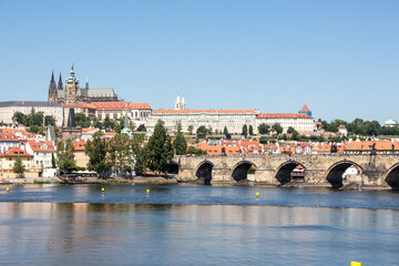 Charles bridge and prague castle sunny panorama old town