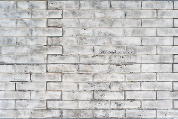 Old brick wall made of white silicate brick. Abstract construction background.