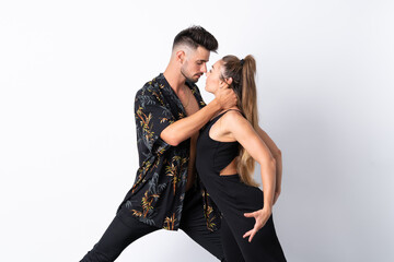 Couple dancing over isolated white background