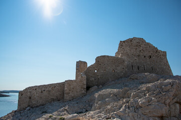 PAG ISLAND, CROATIA - 11.10.2020. - Ruins of medieval fortress Fortica. It is situated next to Pag bridge.