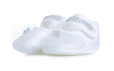 White baby's bootees on white background isolation