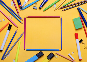 Mockup of pencils, highlighters on yellow background