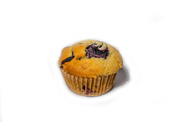 Blueberry muffin against white background.