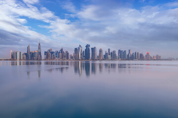 The skyline of Doha, Qatar during sunset