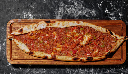 Traditional Turkish Cuisine; pide with cubed meat / kusbasili pide.Turkish pita concept..