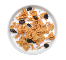 milk, bran and raisin cereal in a bowl , top view