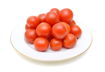Studio shot of cherry tomatoes in plate on white