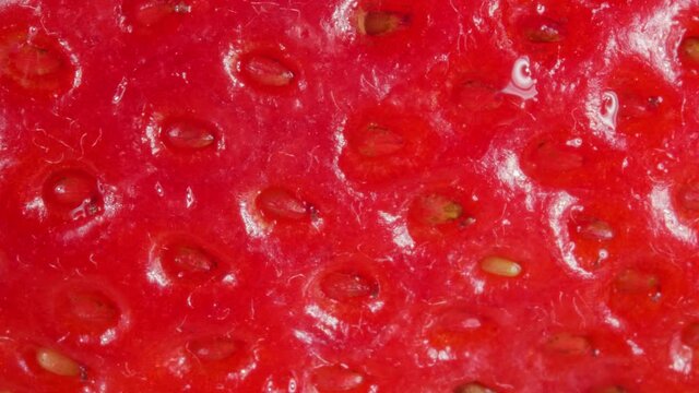 Strawberries close-up. Extreme macro. Ripe berry. Juicy fruit.