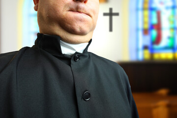 obese priest in the church