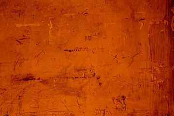 Copper colored wall texture background with textures of different shades of copper or bronze