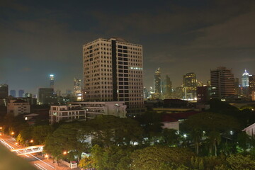 Fototapeta na wymiar cityscape building and street in night at Bangkok Thailand