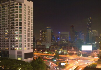 cityscape building and street in night at Bangkok Thailand
