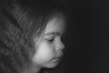 Little girl in profile black and white photo