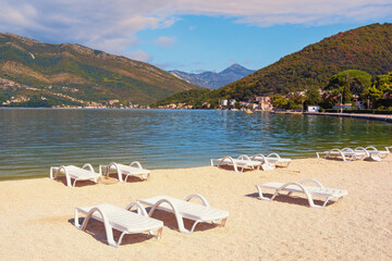 Fototapeta na wymiar Beautiful Mediterranean landscape on sunny autumn day. Montenegro, view of Bay of Kotor near Tivat city