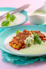 Homemade fritters made from zucchini and carrots.