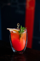 Making cocktails at home like an expert nightclub barman.