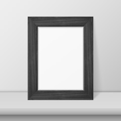 Vector 3d Realistic Black Wooden Simple Modern Frame on a White Shelf or Table and White Wall Background. It can be used for presentations. Design Template for Mockup, Front View