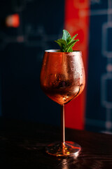 Cold mint cocktail in a copper glass.