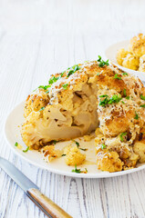 Cauliflower baked in the oven with parmesan cheese closeup