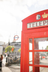 British Telephone Booth with an Underground Entrance in the Background