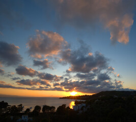 sunset with clouds over the sea