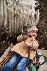 Girl Having Fun With Pony
