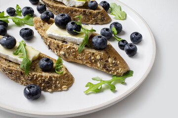 baguette with brie and blueberries