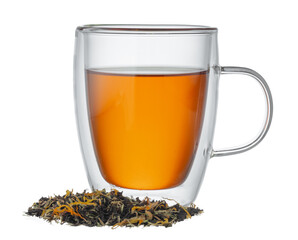 Glass cup of tea with dry tea leaves isolated on white