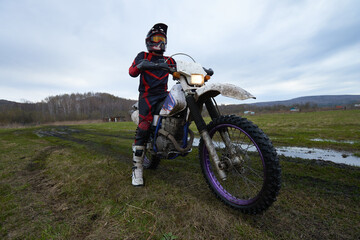 Fototapeta premium Rider starting racing in the countryside
