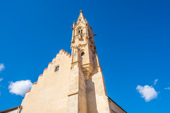 The tower of Clarissine Klarisky Church and Monastery. Bratislava. Capital of Slovakia. Gothic church architecture against blue sky