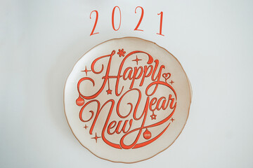 Happy 2021 New Year. Typography Happy New Year handwritten plate.