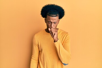 Fototapeta na wymiar African american man with afro hair wearing casual clothes feeling unwell and coughing as symptom for cold or bronchitis. health care concept.